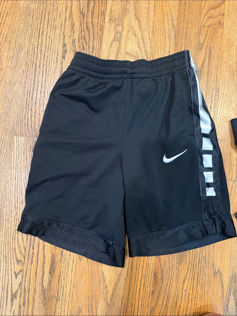 Nike Black Youth Athletic Shorts with Silver Stripe